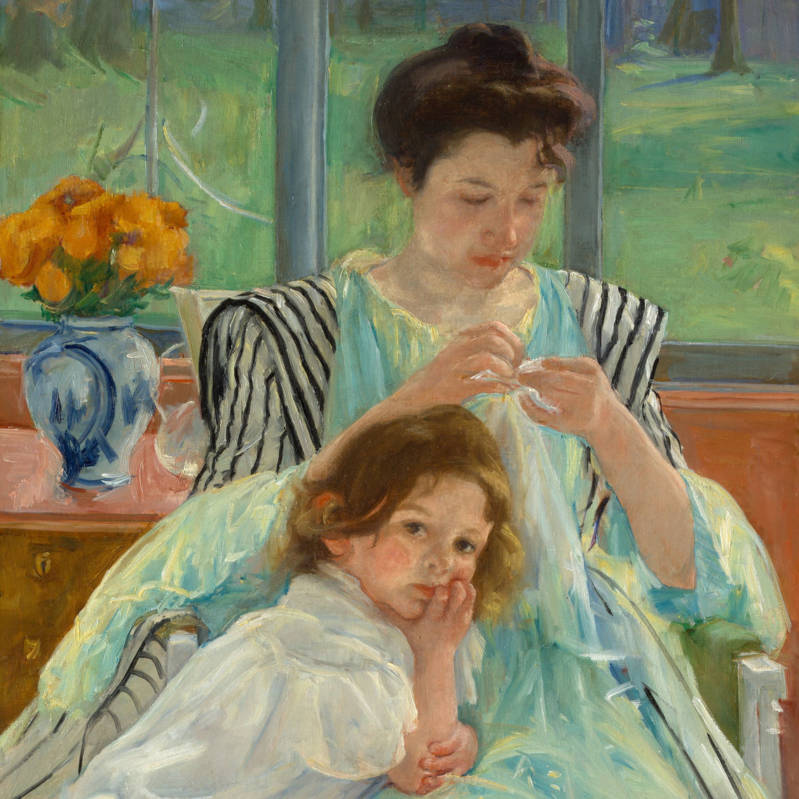 young mother sewing 1900